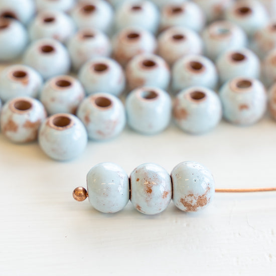 10mm Shiney Glazed Ceramic Round Beads - Baby Blue