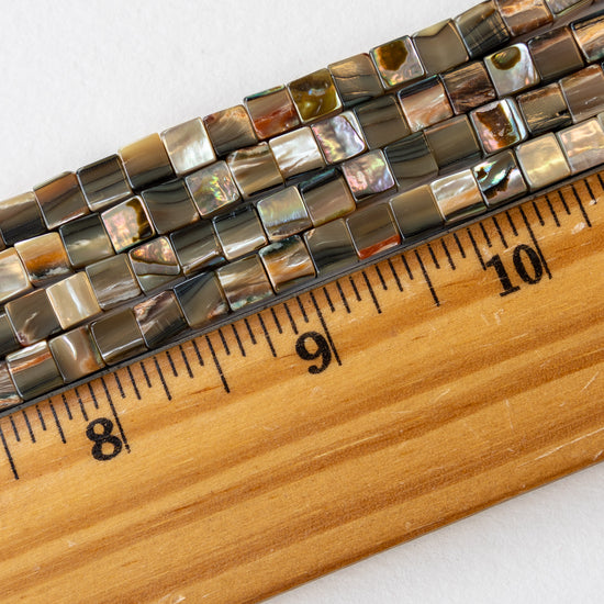 Load image into Gallery viewer, 5mm Abalone Cube Beads - 16 Inch Strand
