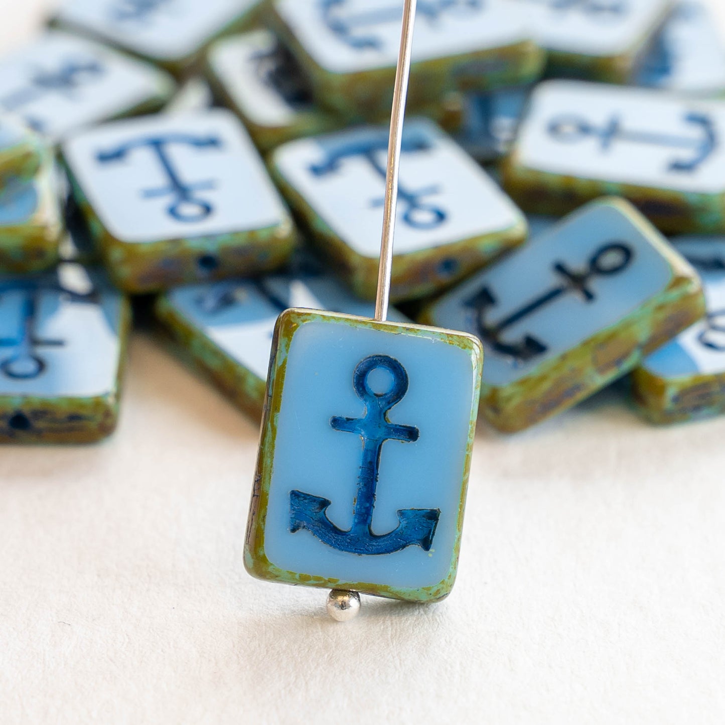 Load image into Gallery viewer, 15x12mm Glass Anchor Beads - Blue with Blue Wash
