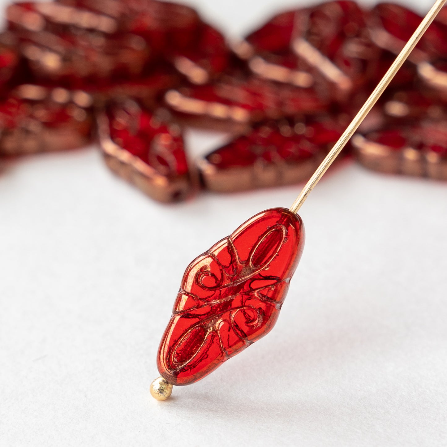 Load image into Gallery viewer, 9x19mm Arabesque Beads - Red with Bronze Wash - 10 or 30
