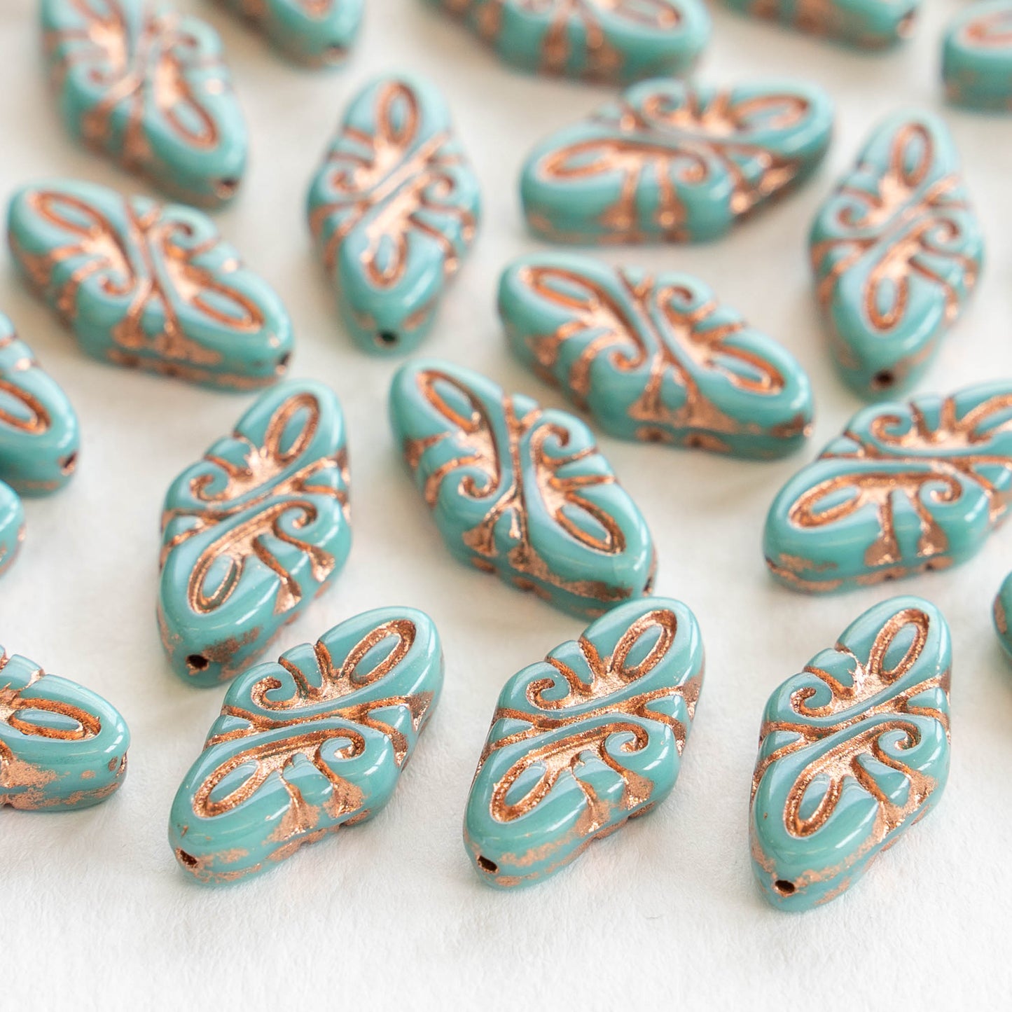 9x19mm Arabesque Beads - Turquoise with Bronze Wash