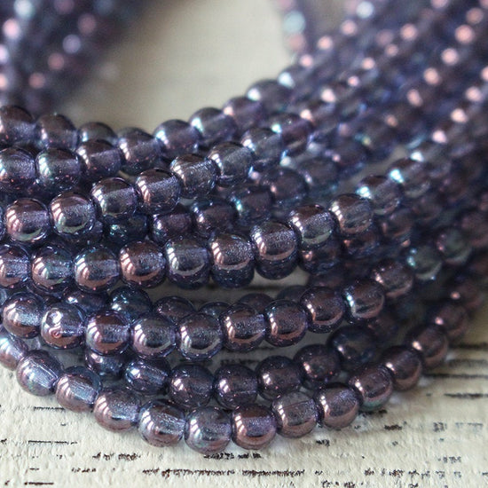 Load image into Gallery viewer, 4mm Round Glass Beads - Amethyst Luster - 100 beads
