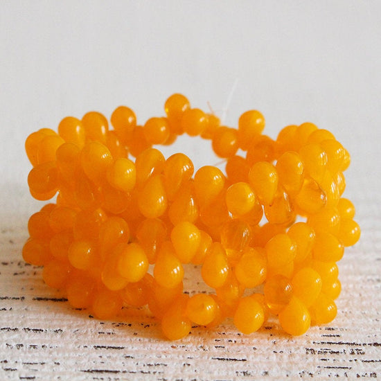 4x6mm Glass Teardrop Beads - Orange Hyacinth - 50 Beads