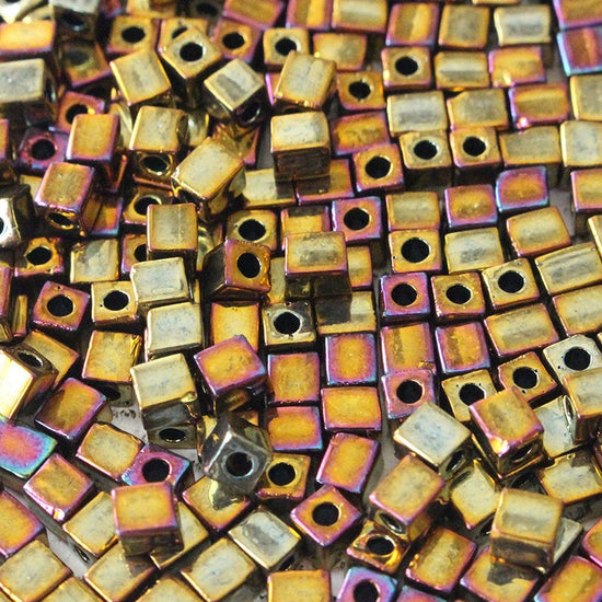 Load image into Gallery viewer, 4mm Miyuki Cube Beads - Metallic Gold Iris  Beads
