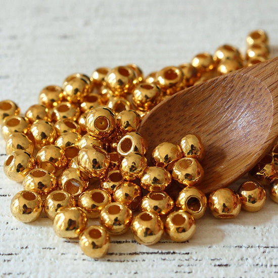 5mm 24K Gold Coated Ceramic Round Beads - Gold