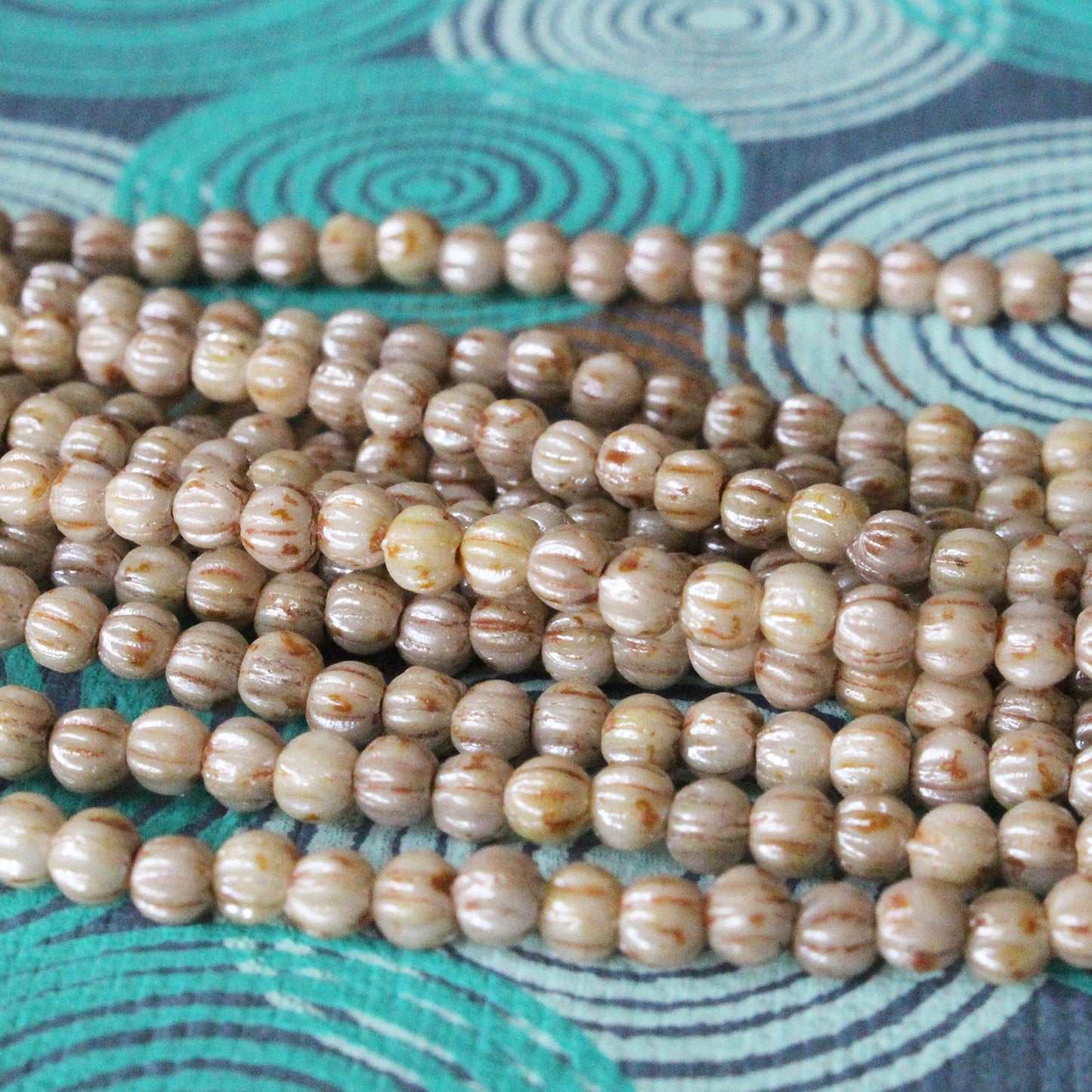 Load image into Gallery viewer, 3mm Melon Beads - Ivory Picasso - 100 Beads
