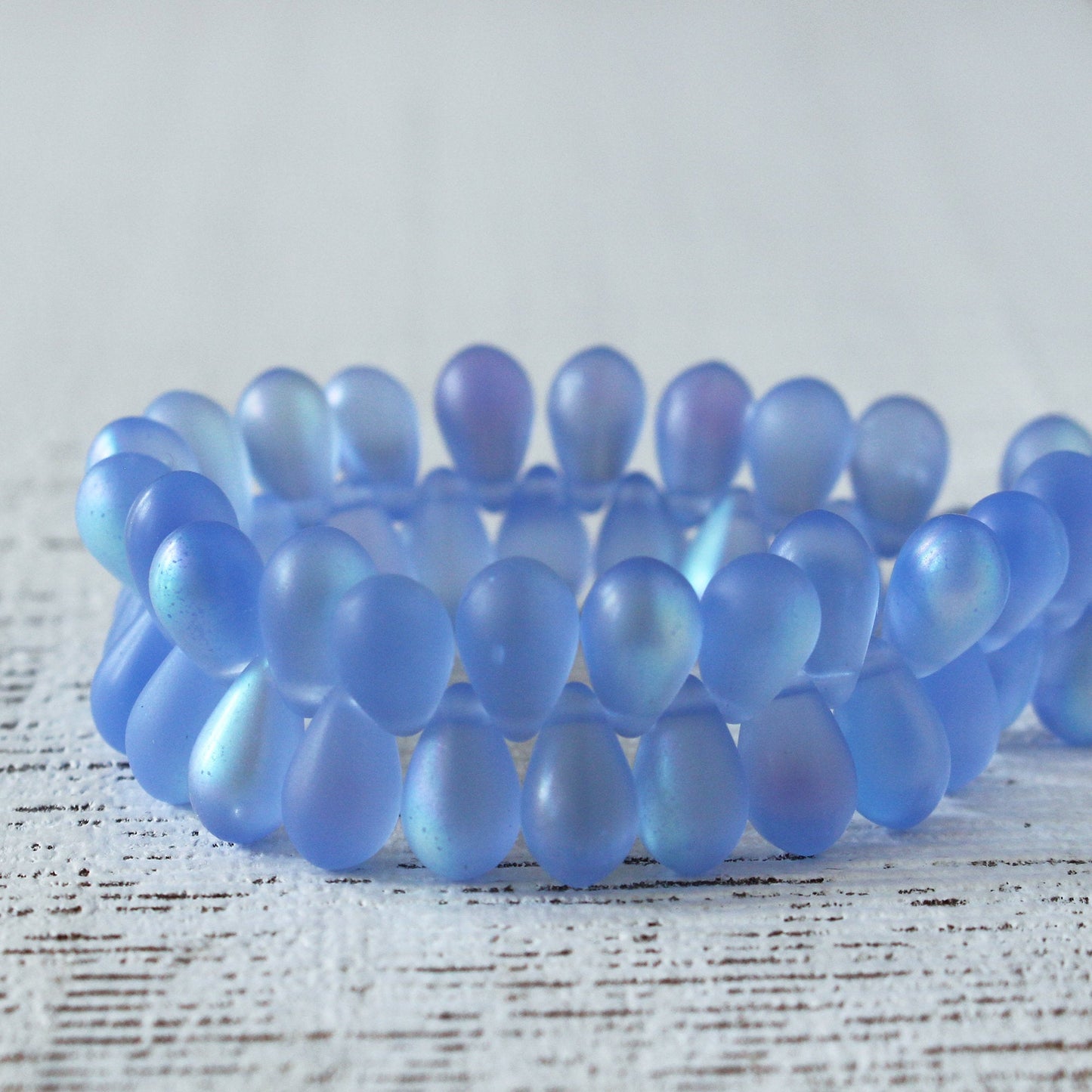 Load image into Gallery viewer, 6x9mm Glass Teardrop Beads - Matte Sky Blue AB - 50 Beads
