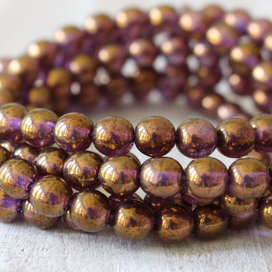 6mm Round Glass Beads - Transparent Purple Bronze Luster