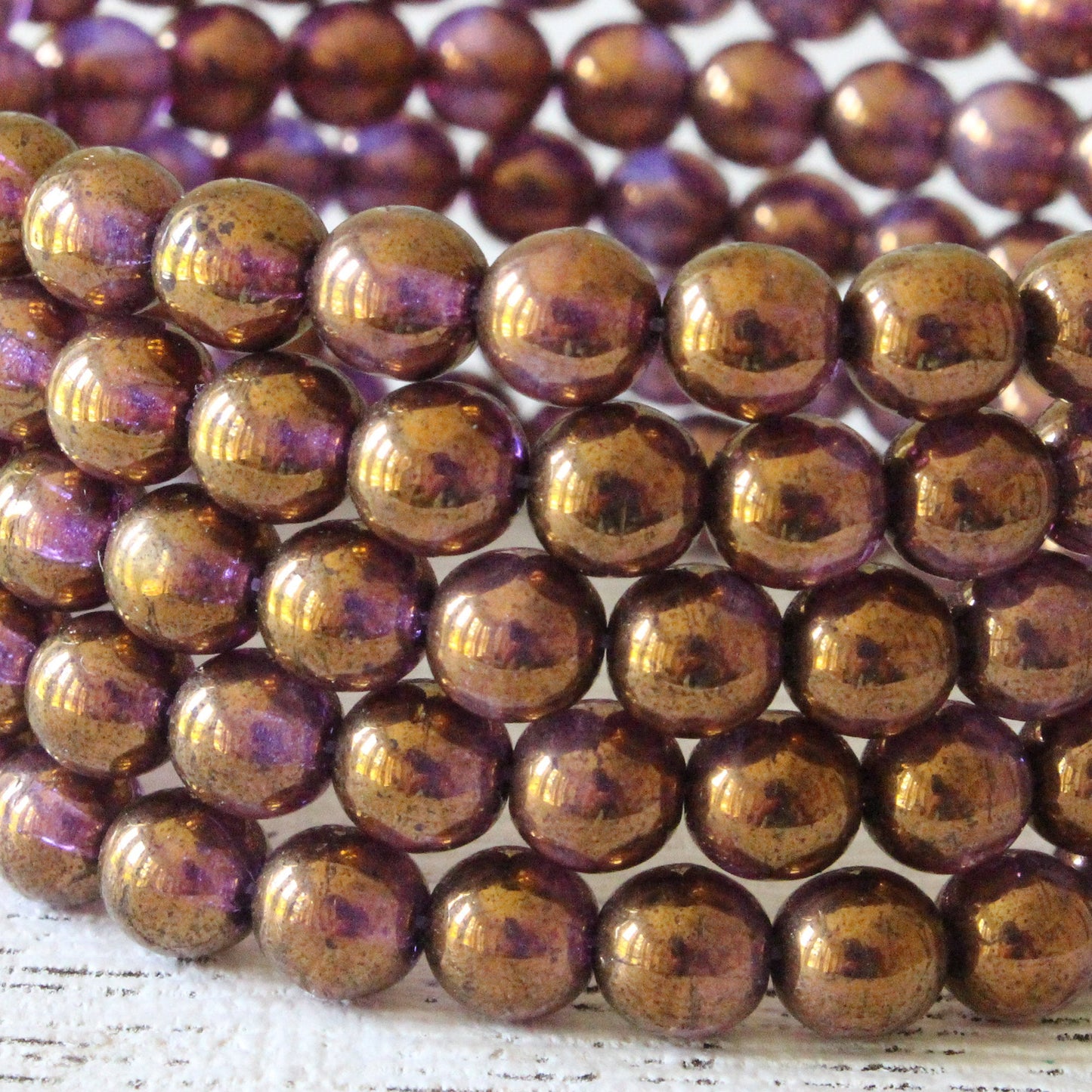 6mm Round Glass Beads - Transparent Purple Bronze Luster