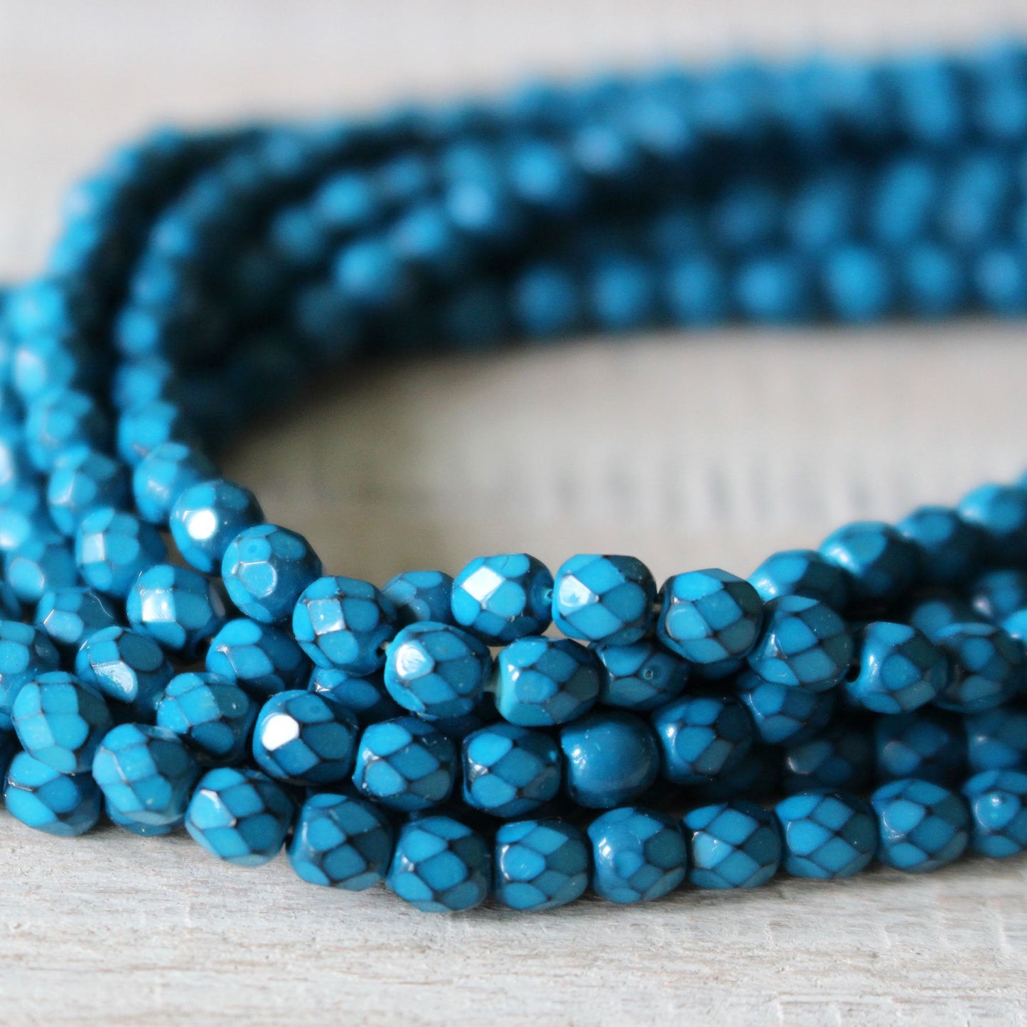 Load image into Gallery viewer, 4mm Round Firepolished Beads - Turquoise Blue  - 50 Beads
