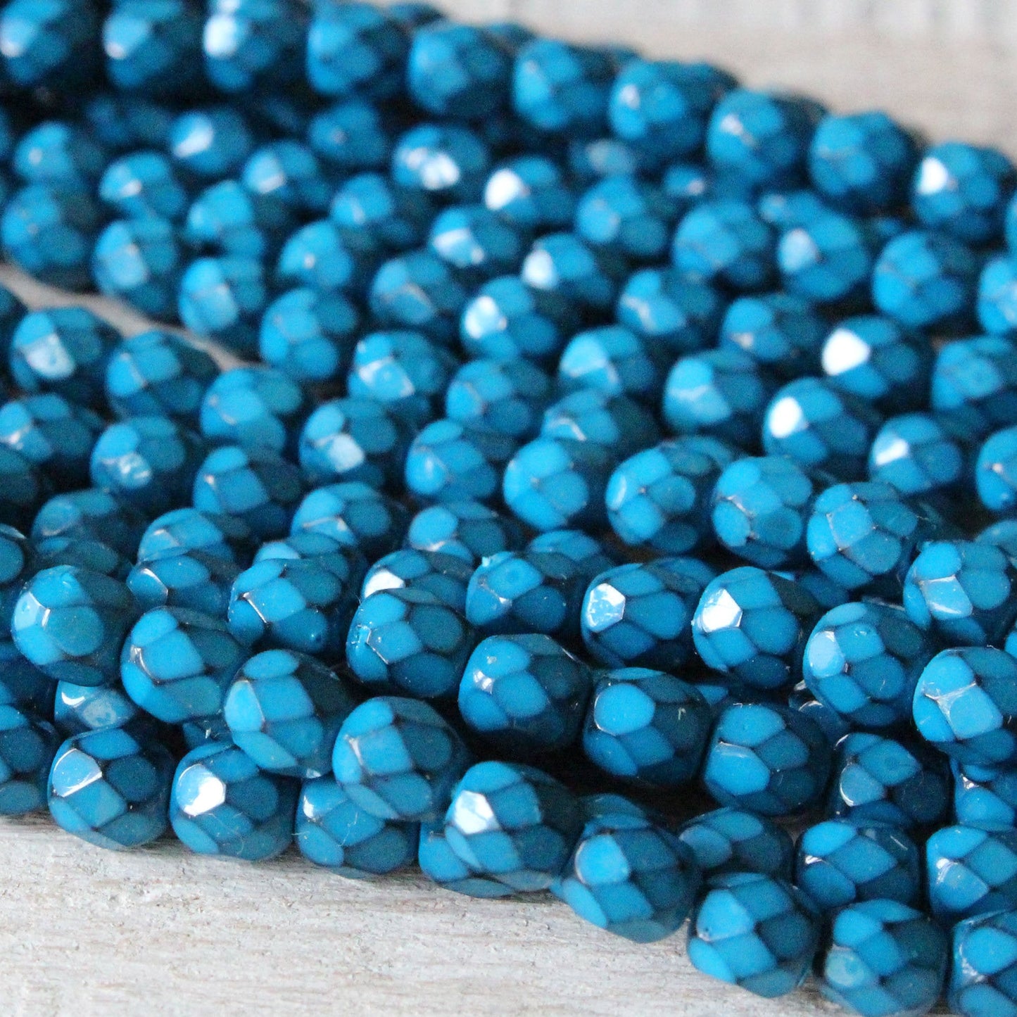 Load image into Gallery viewer, 4mm Round Firepolished Beads - Turquoise Blue  - 50 Beads
