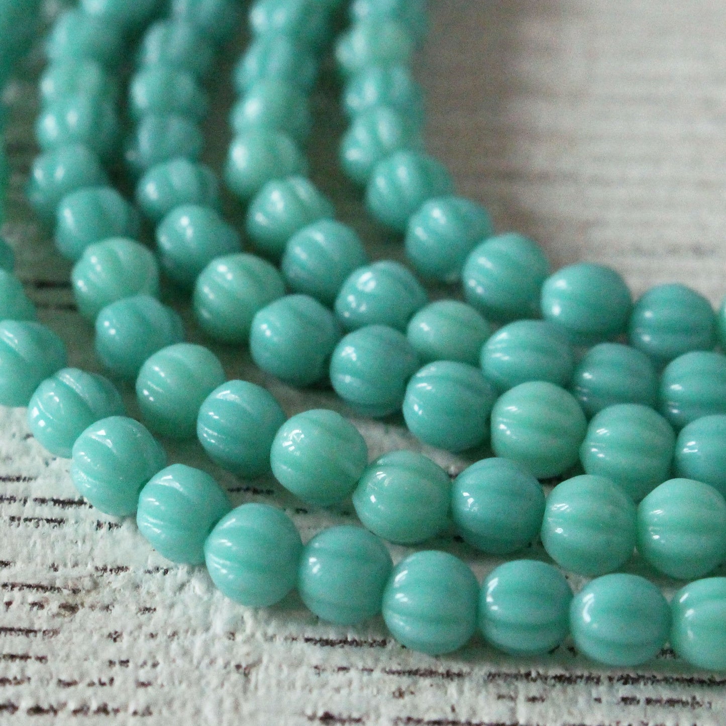 Load image into Gallery viewer, 4mm Melon Beads - Opaque Turquoise - 56 Beads
