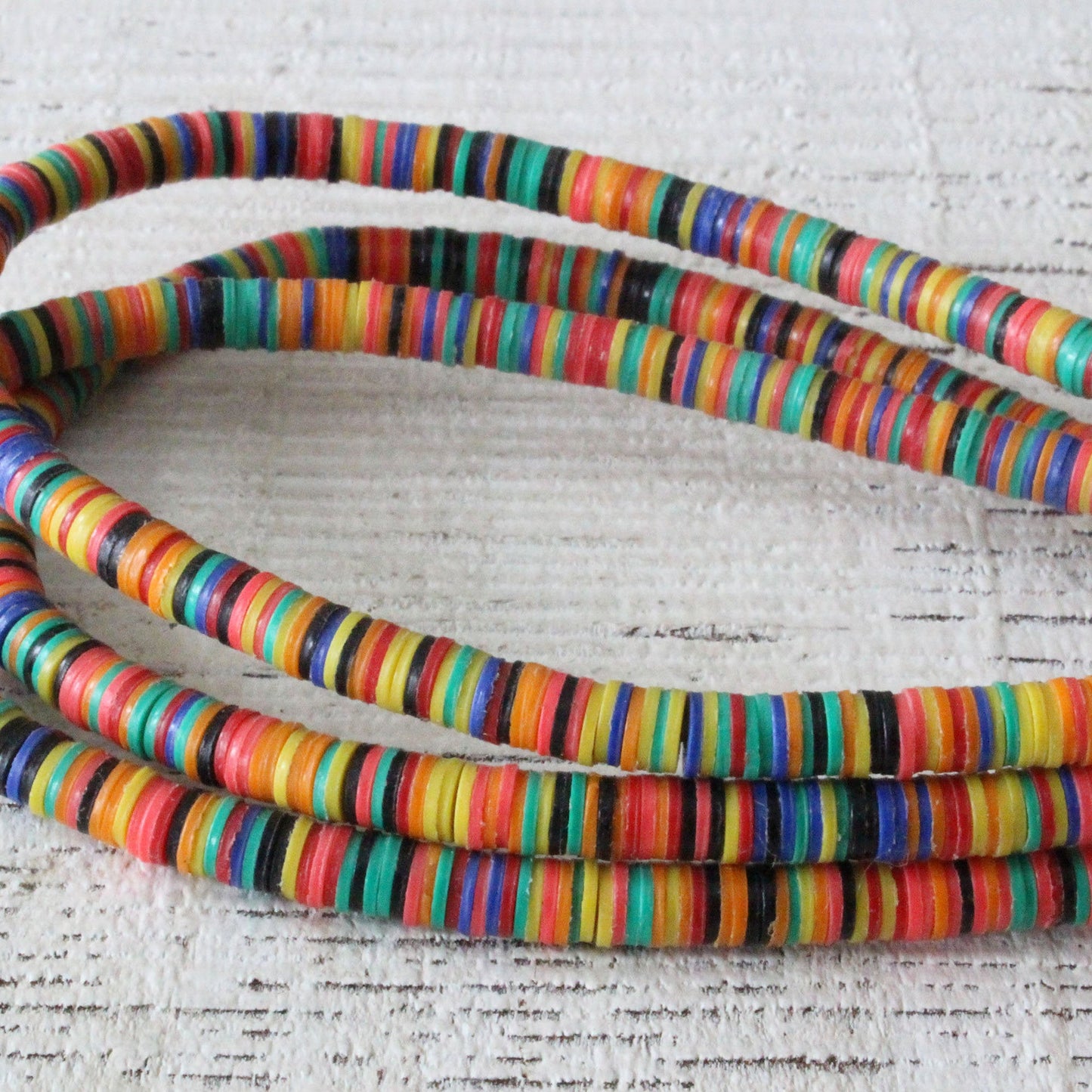 Load image into Gallery viewer, African Made Recycled Vinyl Disks - Colorful Recycled Beads - 33 Inch Strand
