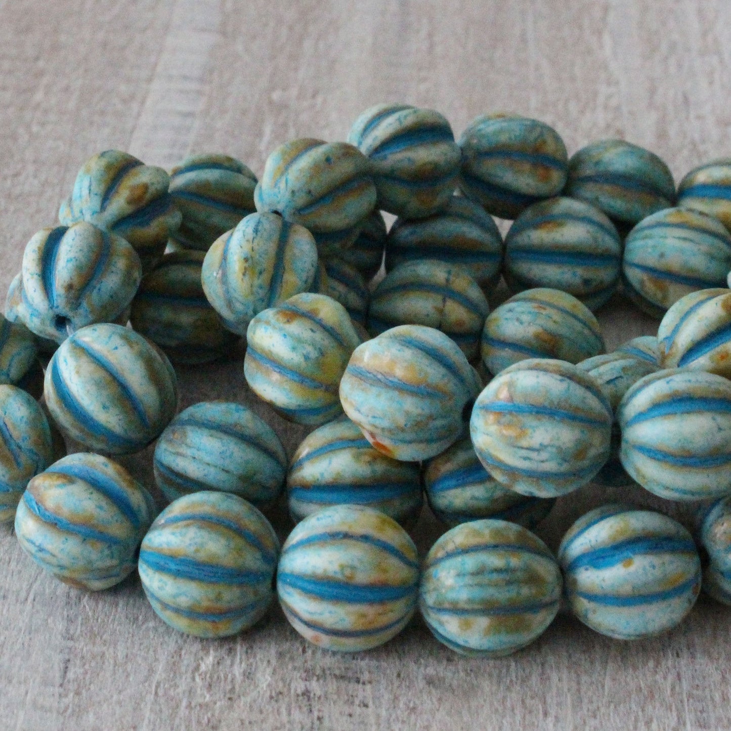 Load image into Gallery viewer, 10mm Melon Beads - Aged Ivory with Turquoise - 15 Beads
