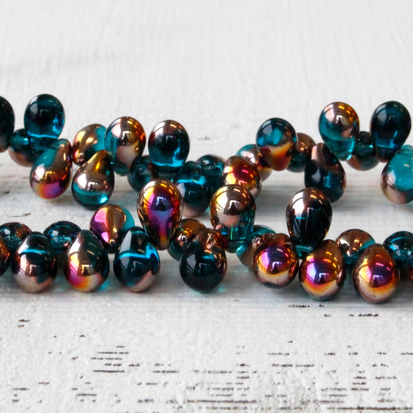 Load image into Gallery viewer, 6x9mm Glass Teardrop Beads - Teal with Gold Marea Finish - 50 Beads
