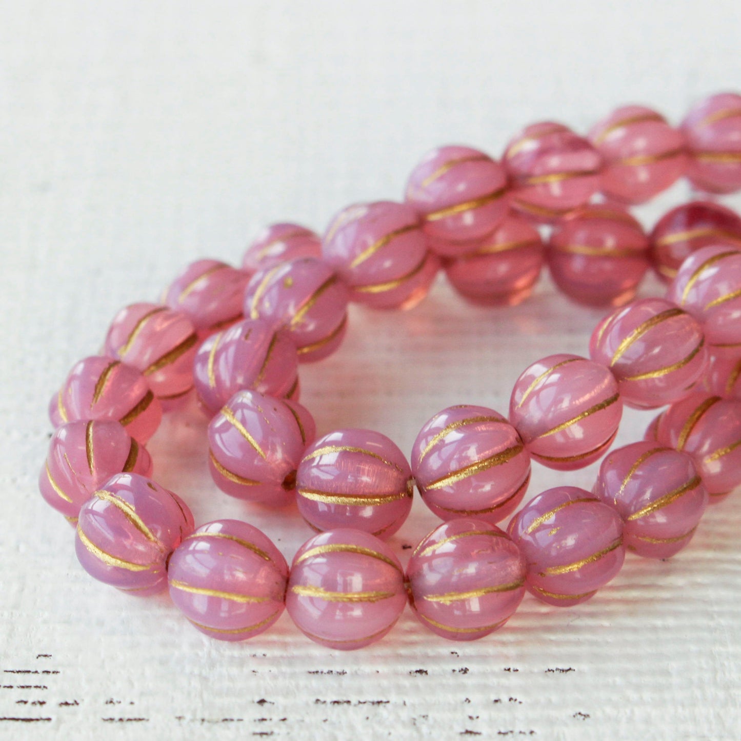 Load image into Gallery viewer, 8mm Melon Beads - Pink Opaline with Gold Wash - 20 Beads
