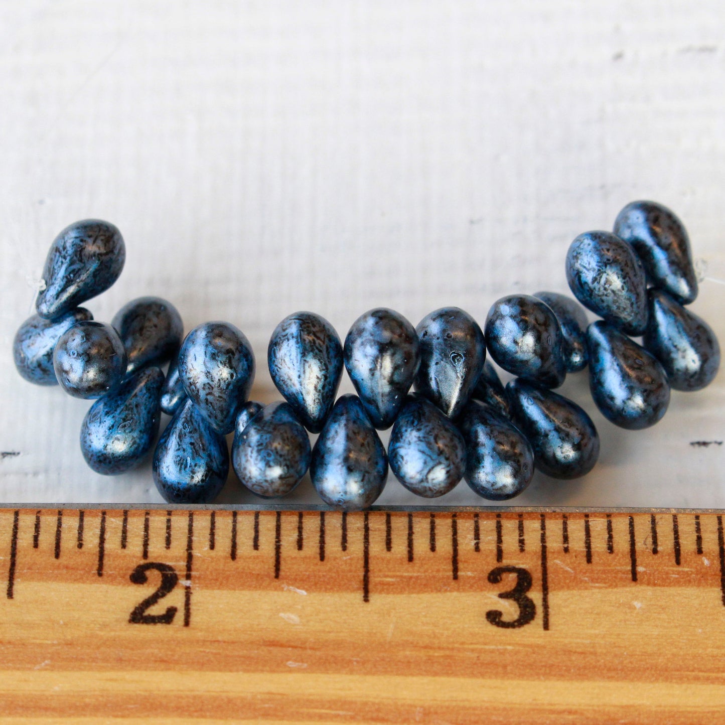 9x6mm Glass Teardrop Beads - Metallic Blue - 25 Beads