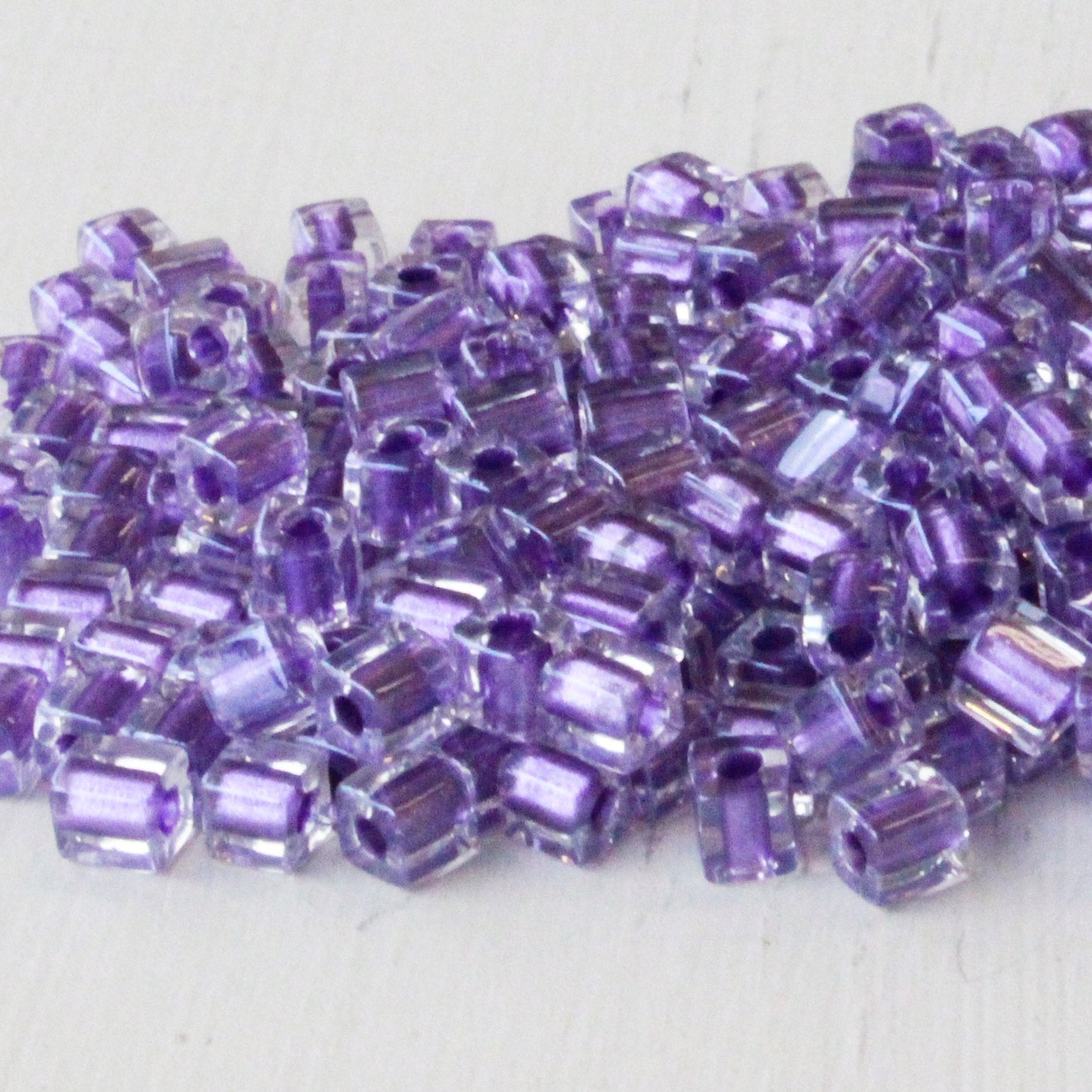 4mm Miyuki Cube Beads  - Purple Lined Crystal