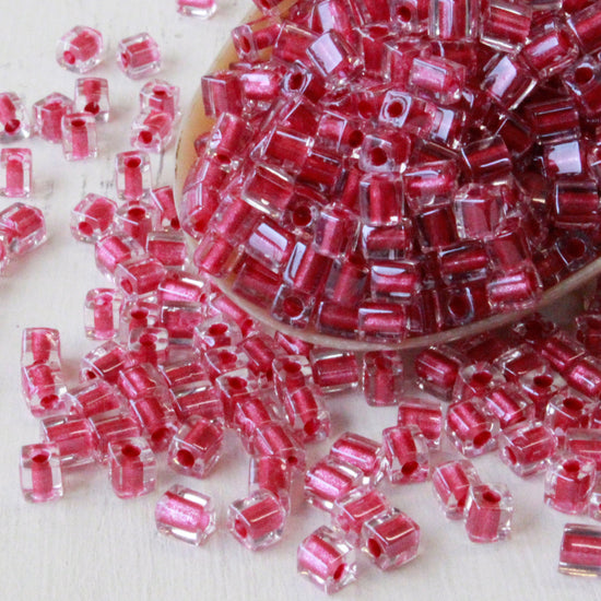 4mm Miyuki Cube Beads  - Rose Lined Crystal