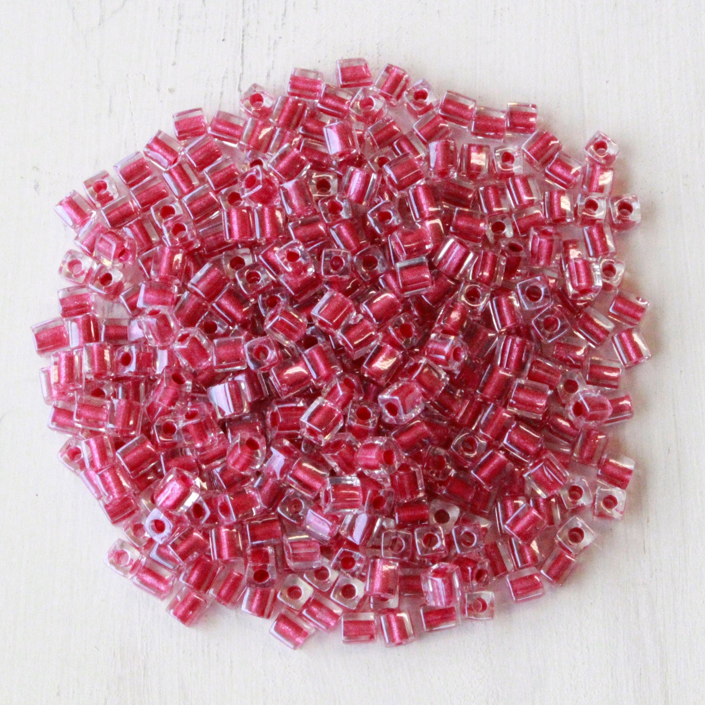 Load image into Gallery viewer, 4mm Miyuki Cube Beads  - Rose Lined Crystal
