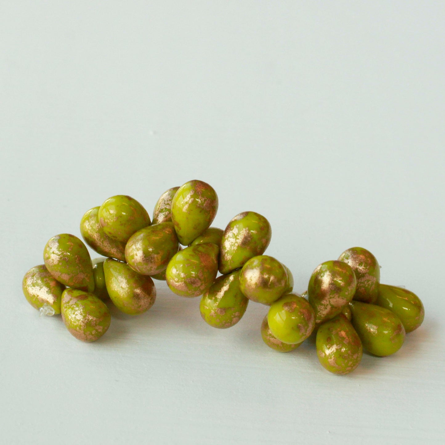 Load image into Gallery viewer, 6x9mm Glass Teardrop Beads - Avocado Green with Gold Dust - 25 Beads
