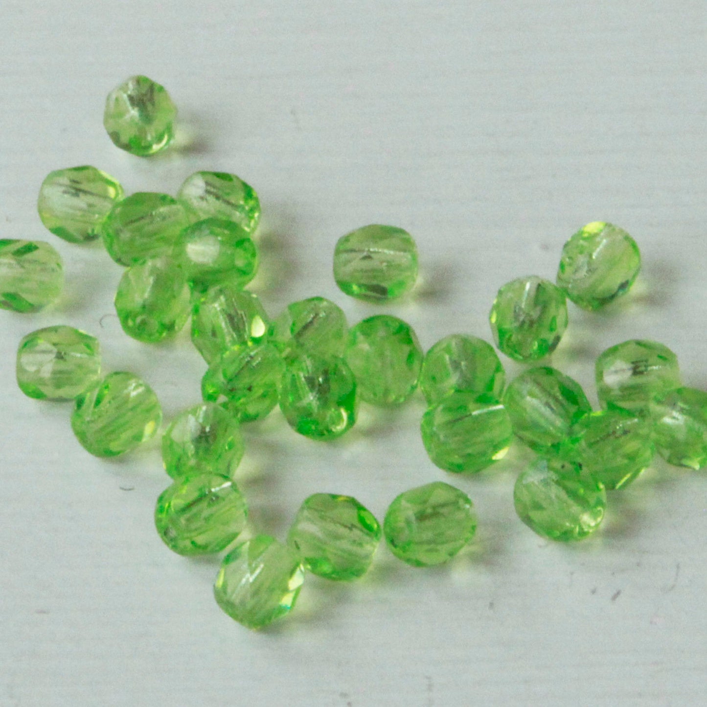 4mm Round Firepolished Beads - Transparent Peridot Green - 60 Beads
