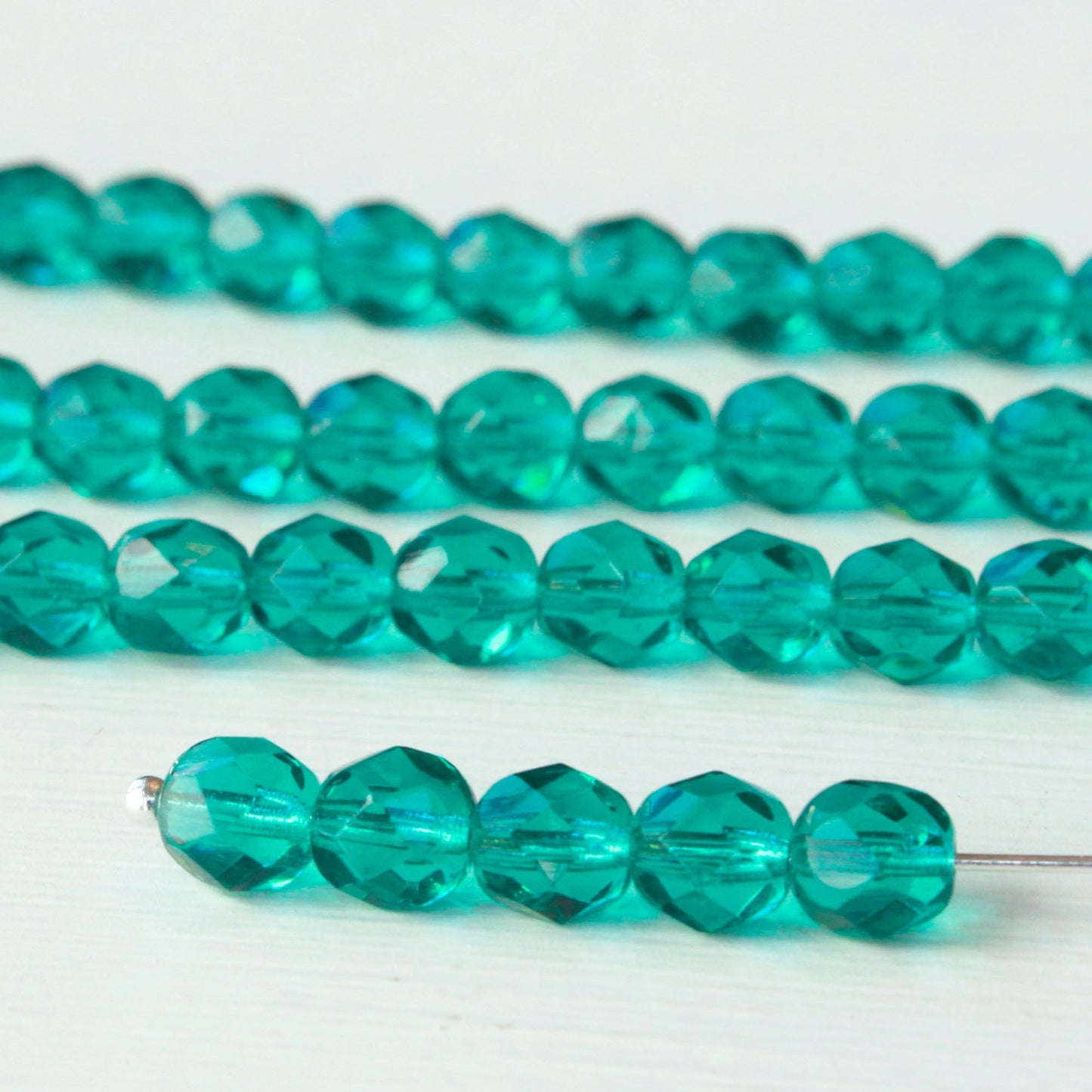 6mm Round Firepolished Glass Beads - Transparent Teal