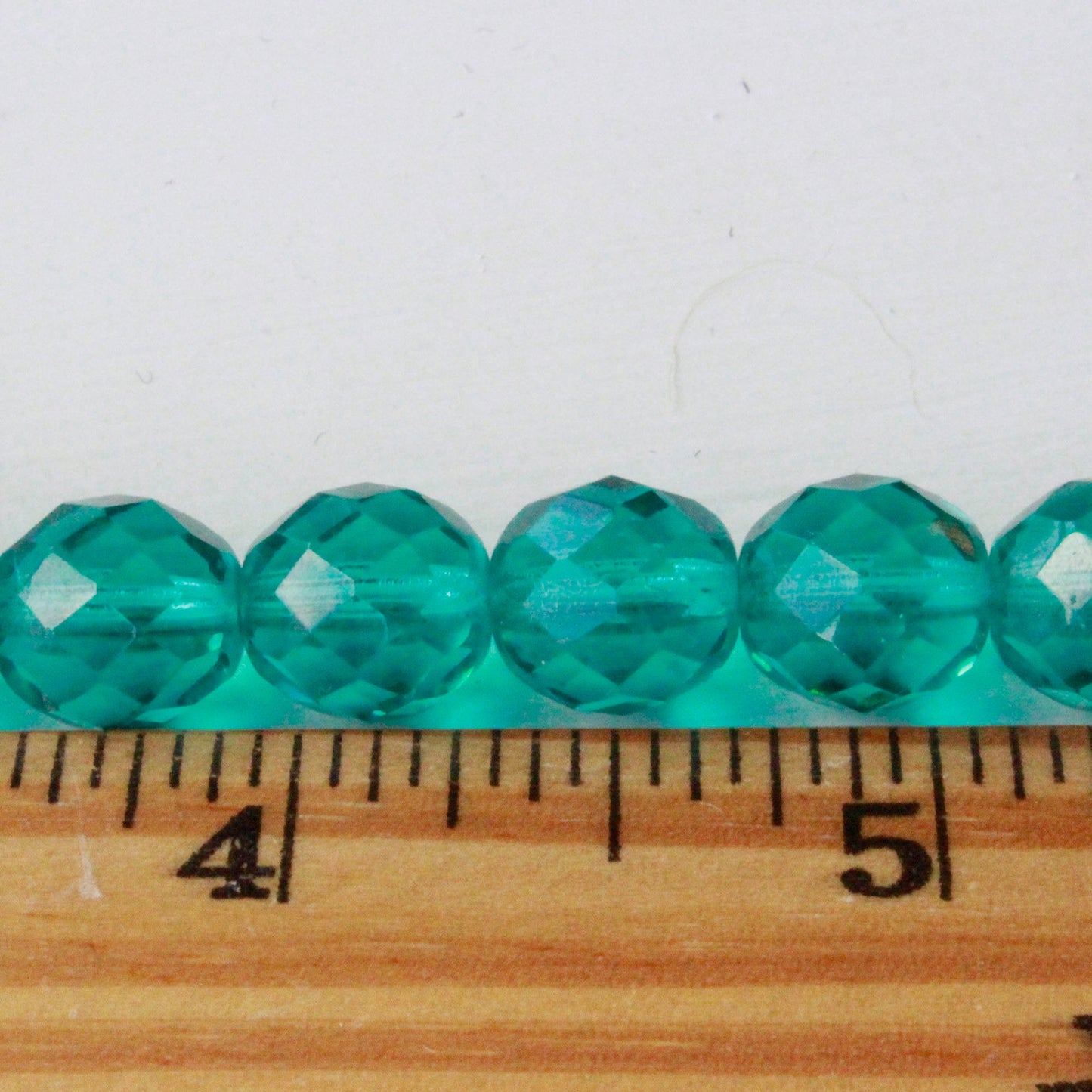 6mm Round Firepolished Glass Beads - Transparent Teal
