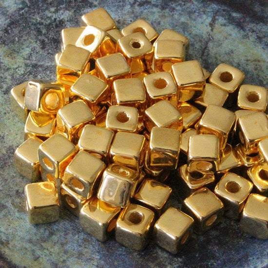 Load image into Gallery viewer, 5.5mm 24K Gold Coated Ceramic Cube Beads - Gold - 10 or 30
