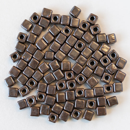 Load image into Gallery viewer, 5.5mm Silver Coated Ceramic  Cube Beads - Bronze - 10 or 30 or 60
