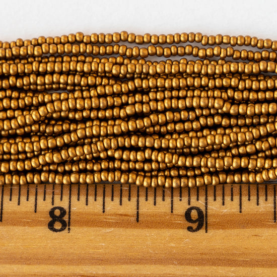 11/0 Glass Seed Beads - Antique Matte Gold - 6 Strands