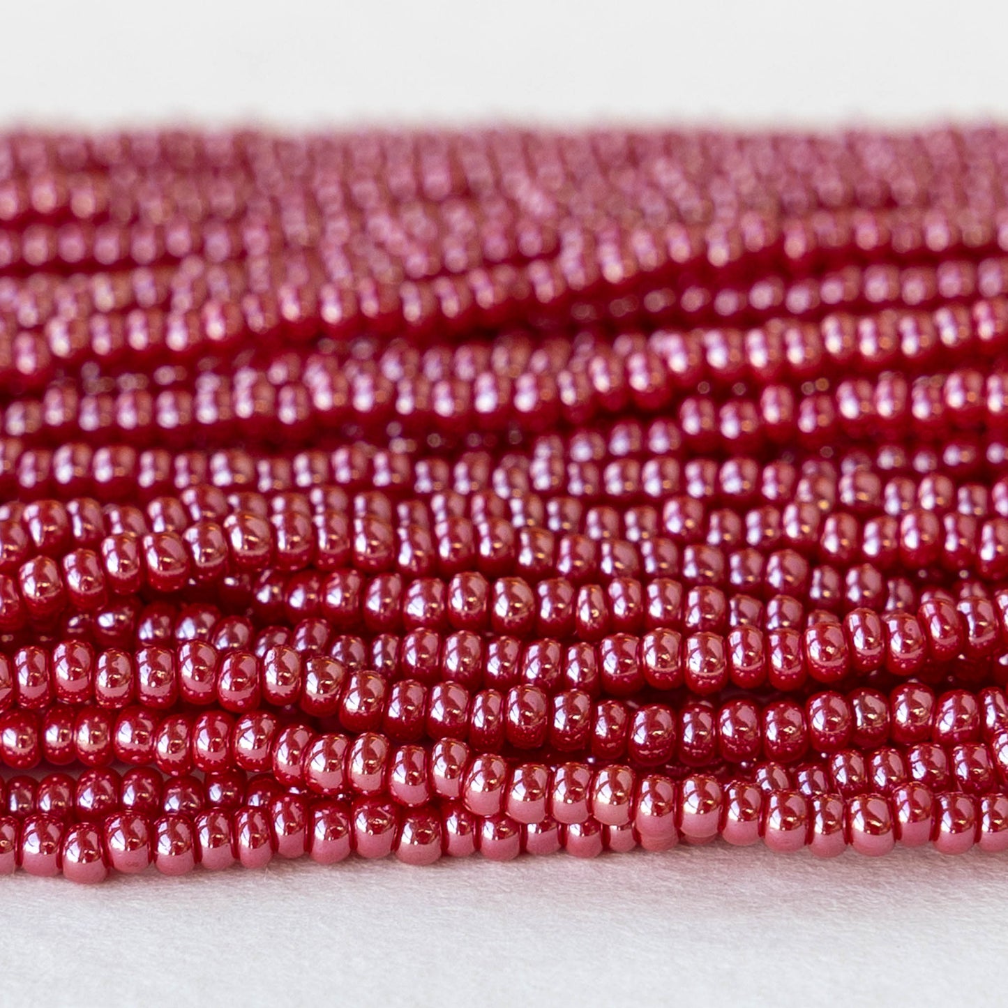 11/0 Glass Seed Beads - Opaque Red Luster - 6 Strands