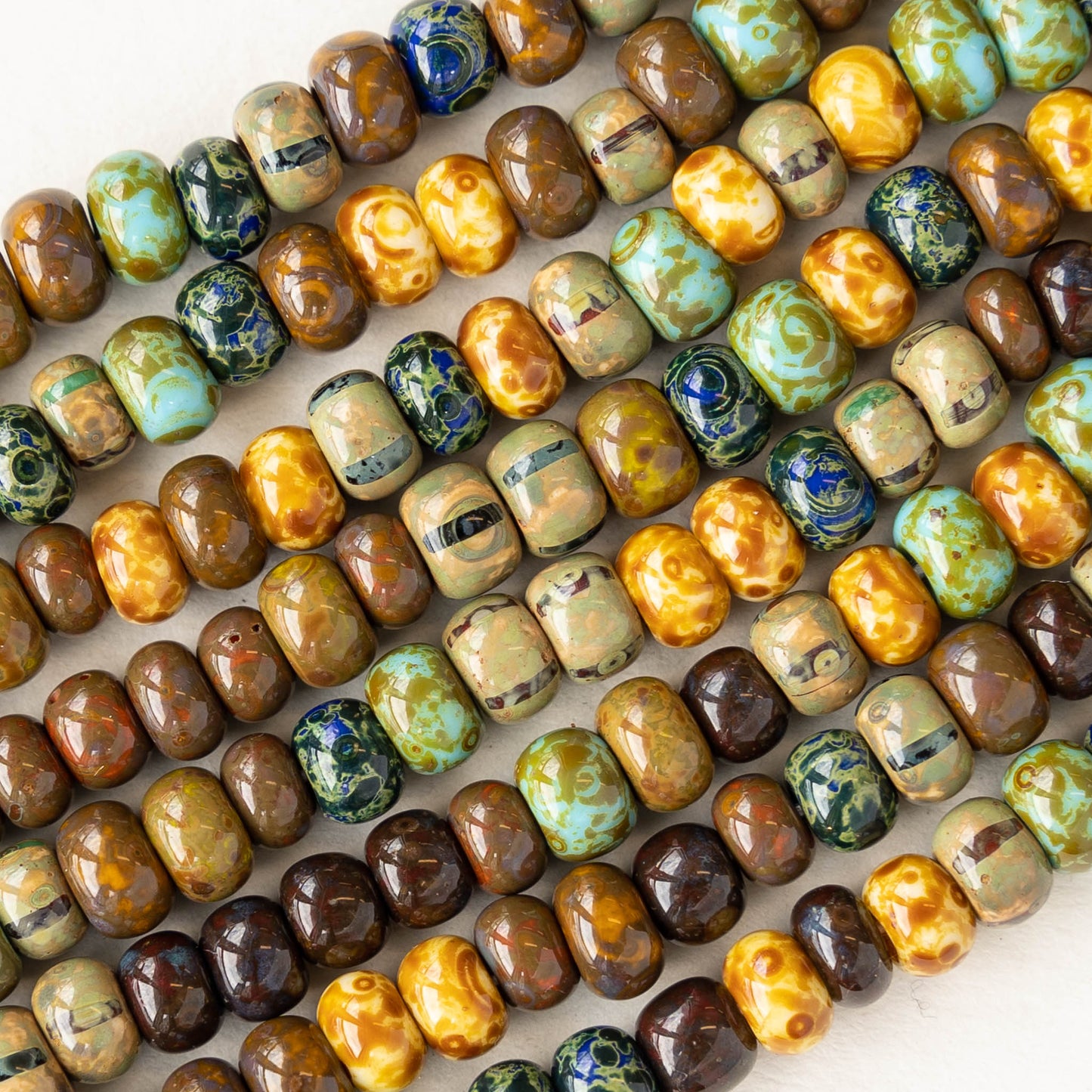Load image into Gallery viewer, 2/0-3/0 Seed Beads - Picasso Mix with Stripes - 10 or 20 Inches
