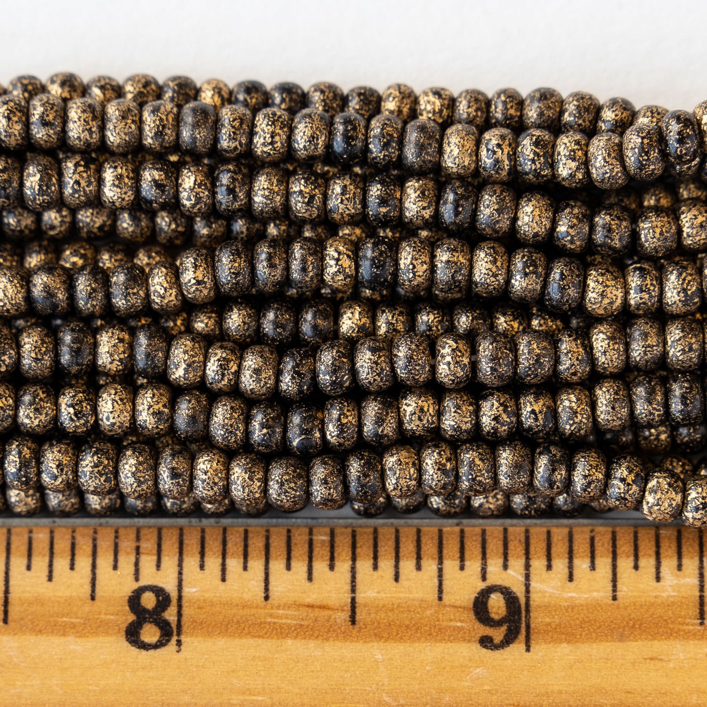 Size 6 Seed Beads - Opaque Black with Gold Dust - Choose Amount