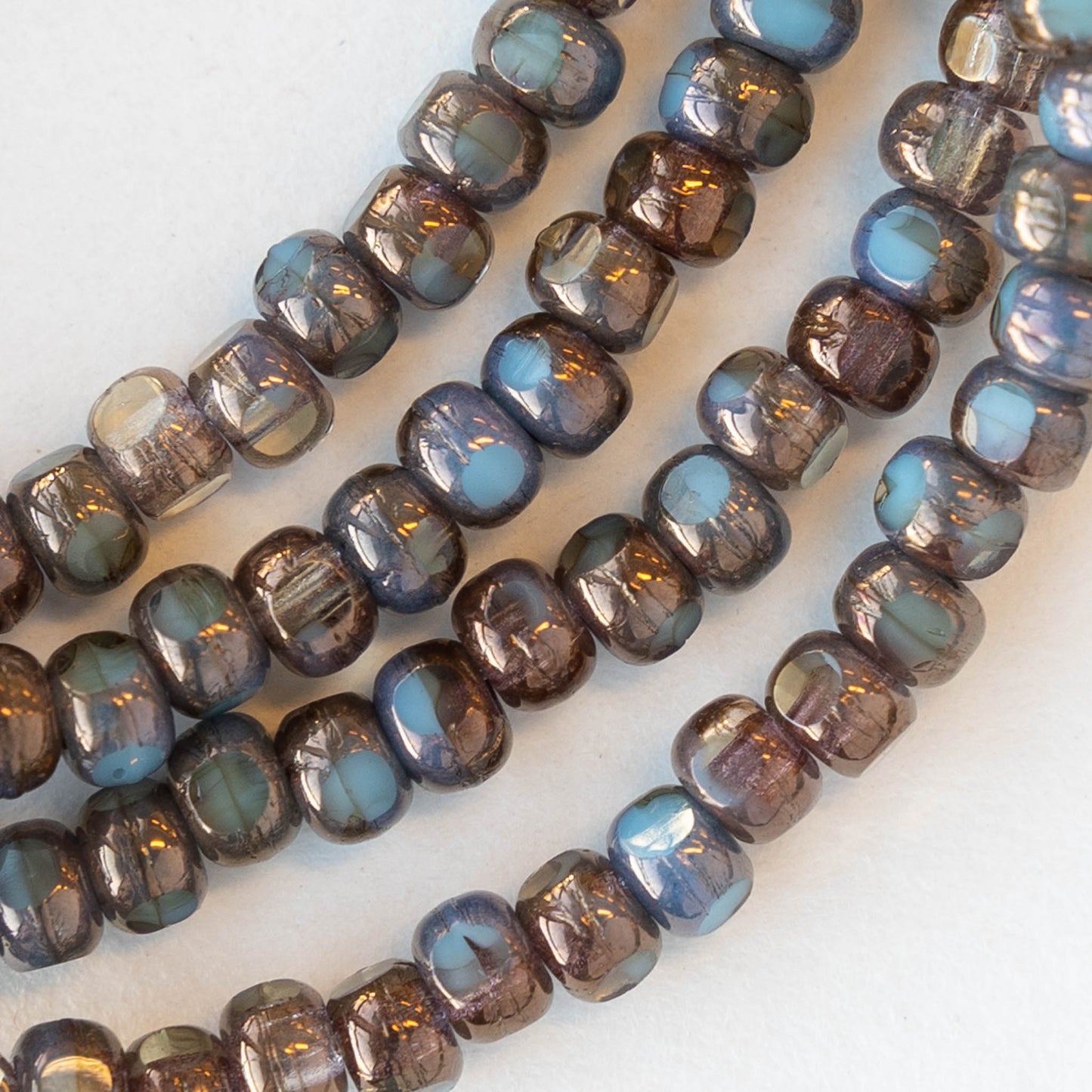 Size 6 Tri-cut Beads - Sky Blue with Bronze Finish - 50 beads