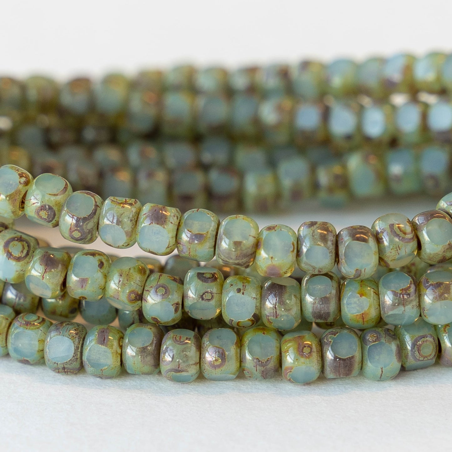 Size 6 Tri-cut Beads - Opaline Sea Green with a Picasso Finish - 50 beads